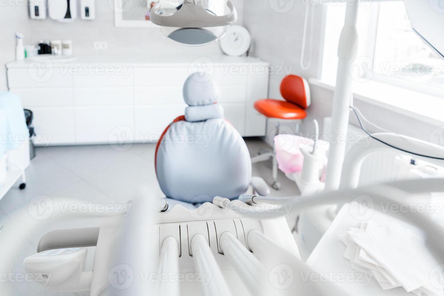 Dental Office Interior with Equipment and Chair photo