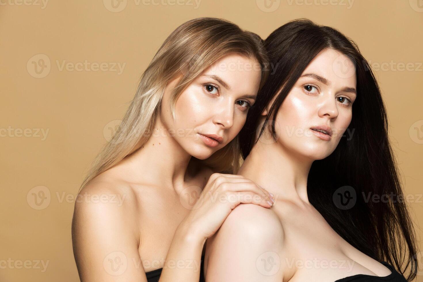 Two Women Showcasing Radiant Skin Beauty photo