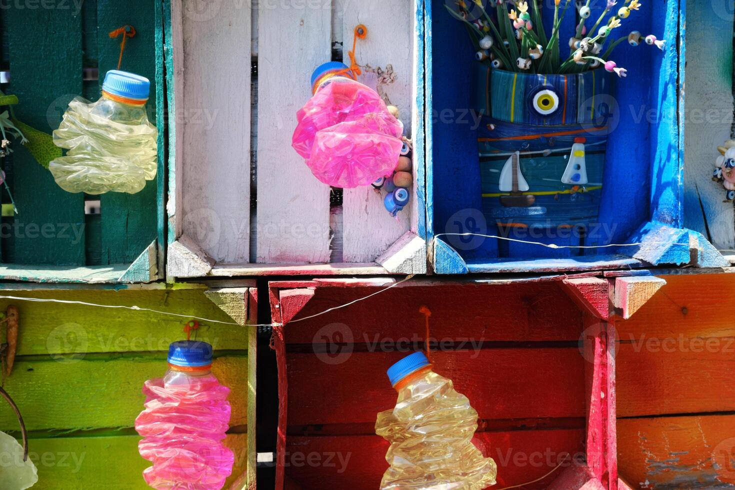 Upcycled Bottles in Colorful Cubbies Decor photo