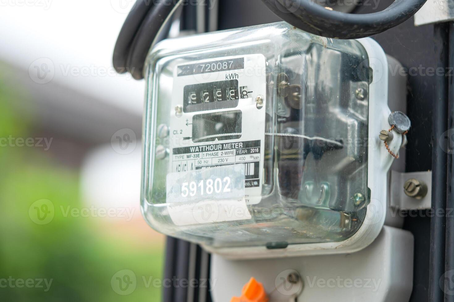 Electric measuring power meter for energy cost at home and office. photo