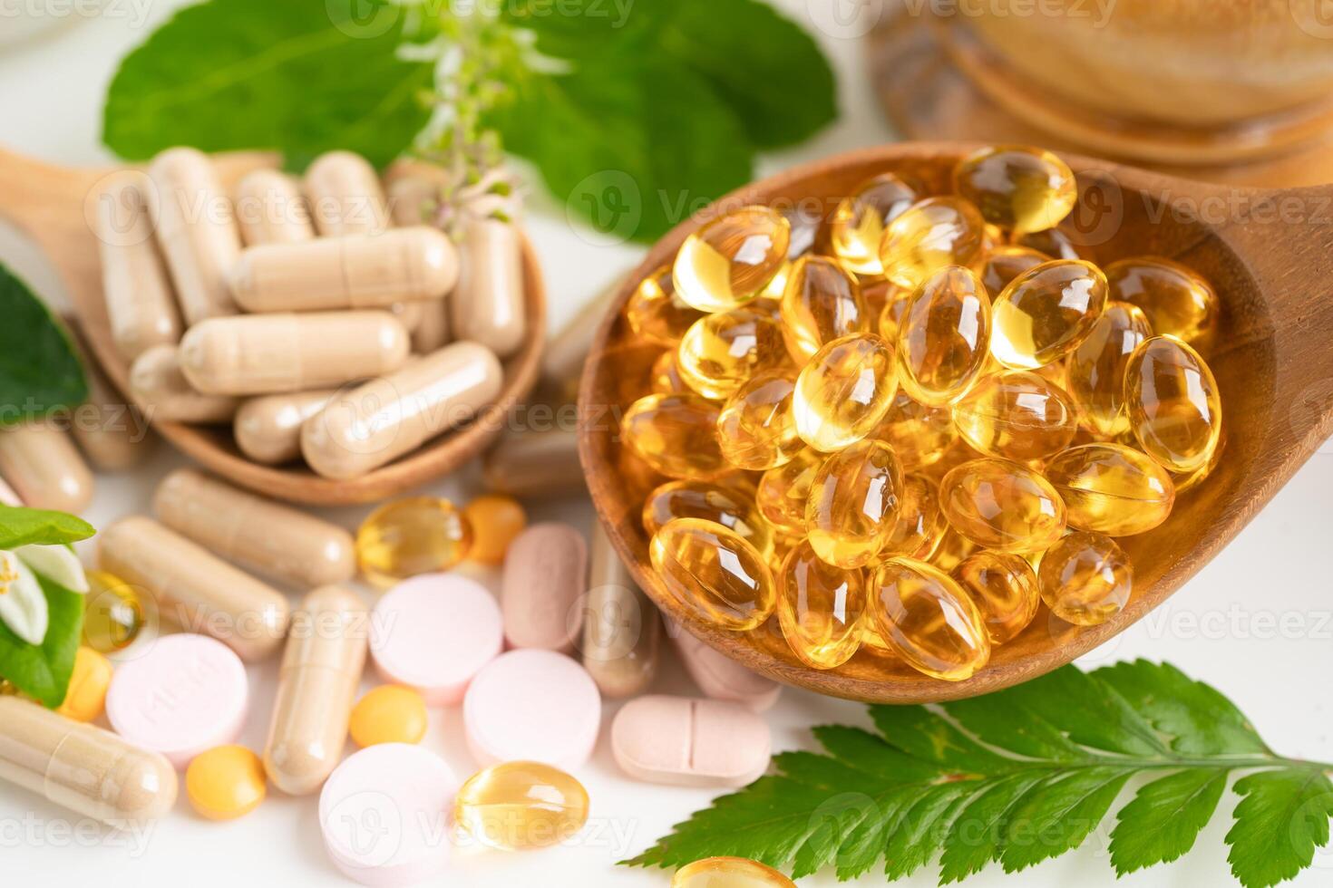 Alternative medicine herbal organic capsule with vitamin E omega 3 fish oil, mineral, drug with herbs leaf natural supplements for healthy good life. photo