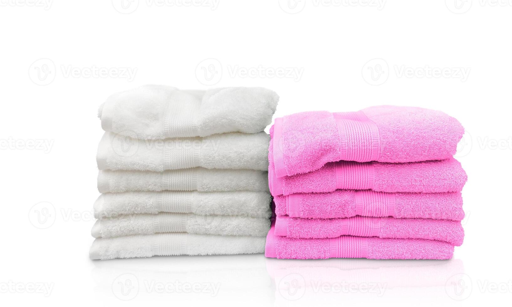 Two piles of folded towels Isolated on a white background photo