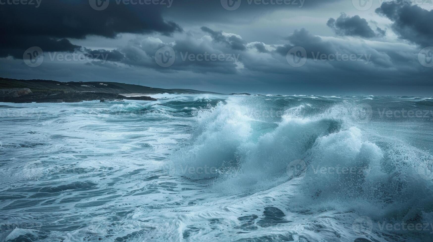 The ocean is rough and the sky is dark and cloudy photo