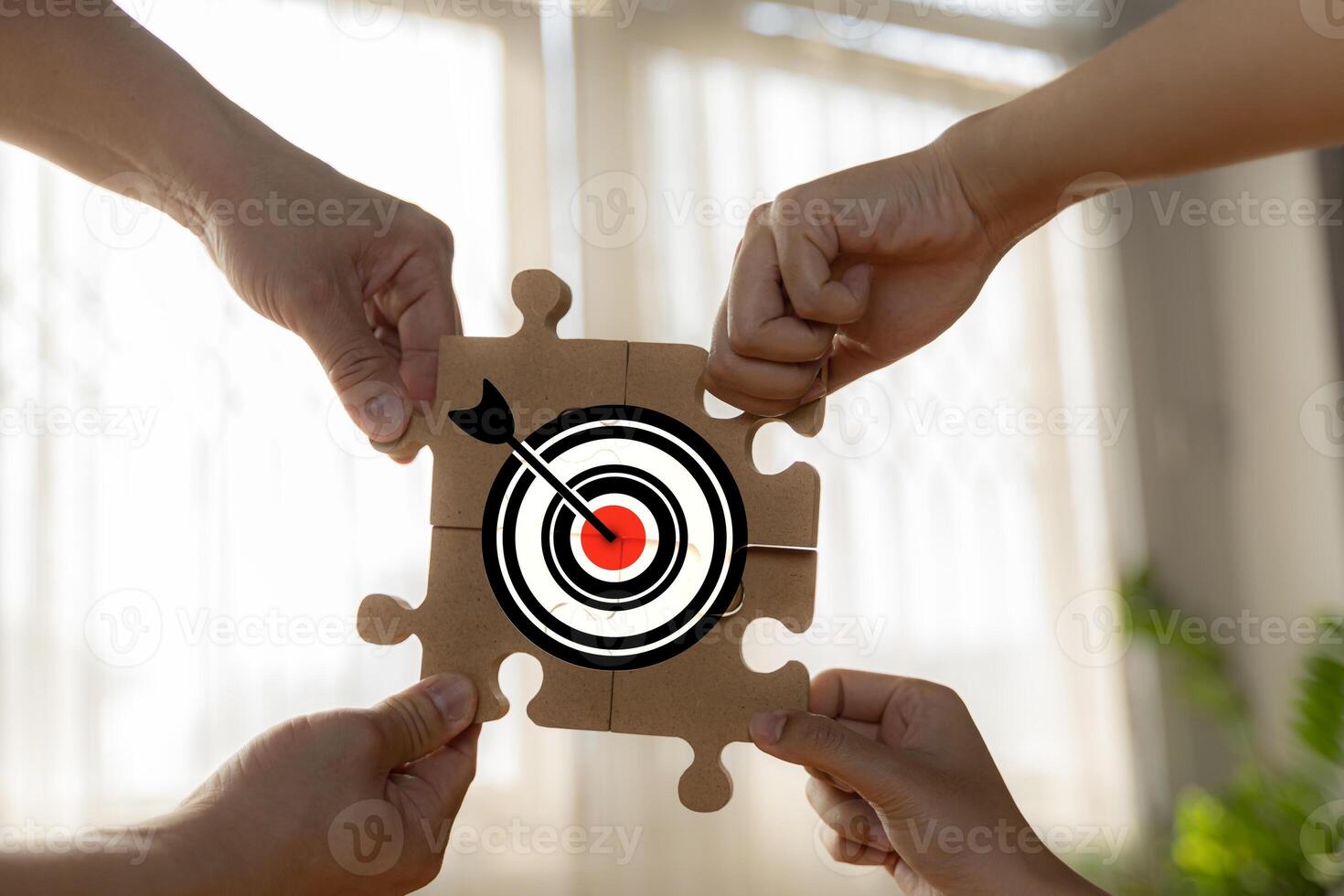 Stakeholder, business connection, teamwork, and team building concept. Close-up wooden figure, as businessman on jigsaw puzzles with target icon symbol photo