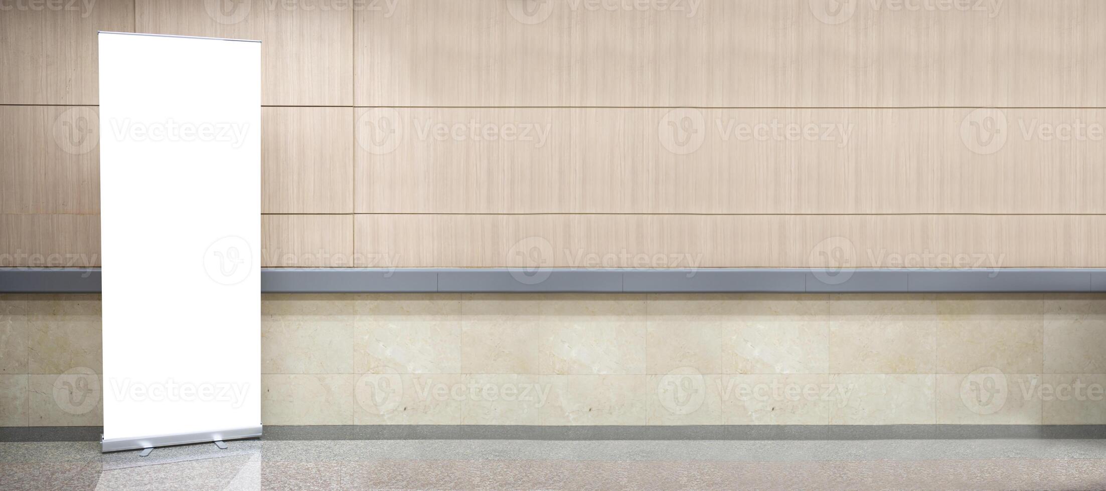 Blank roll up stand banner. Blank mockup for presentation isolated on wall background in hospital photo