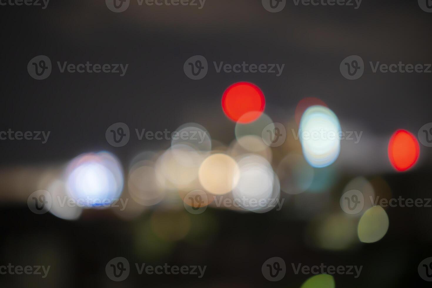 Night city street lights bokeh background photo