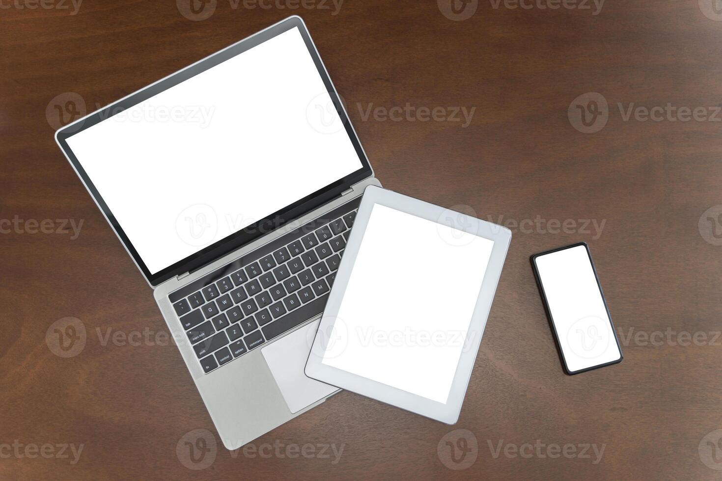 Set of gadgets. Laptop, laptops tablets, smartphones. Programmer workplace concept. Top view. IT technologies photo