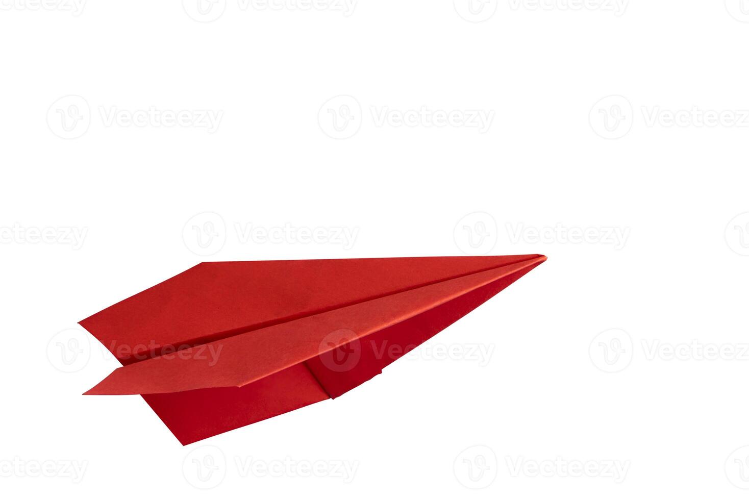 Paper airplane. Red paper plane on white background, top view. photo