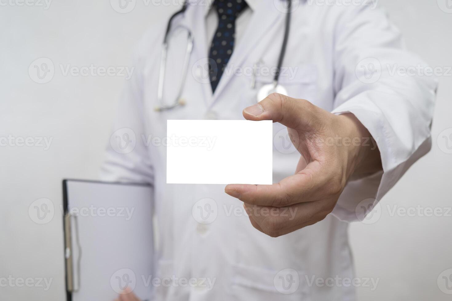 The doctor, the pharmacist, the doctor handed the business card to him. photo