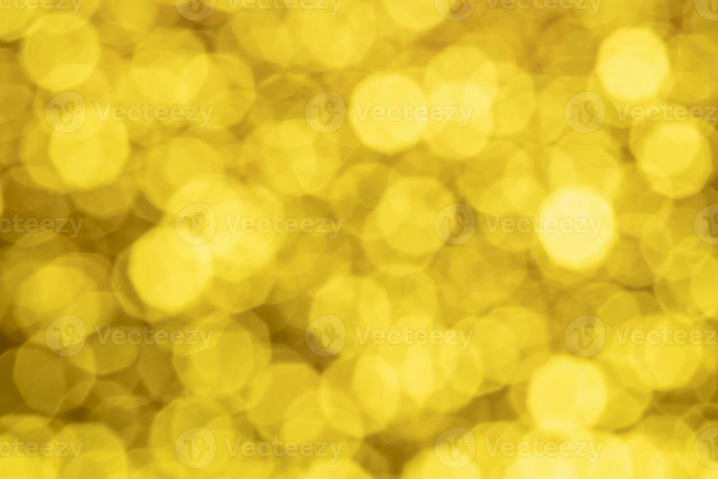 Gold abstract background with bokeh defocused lights photo