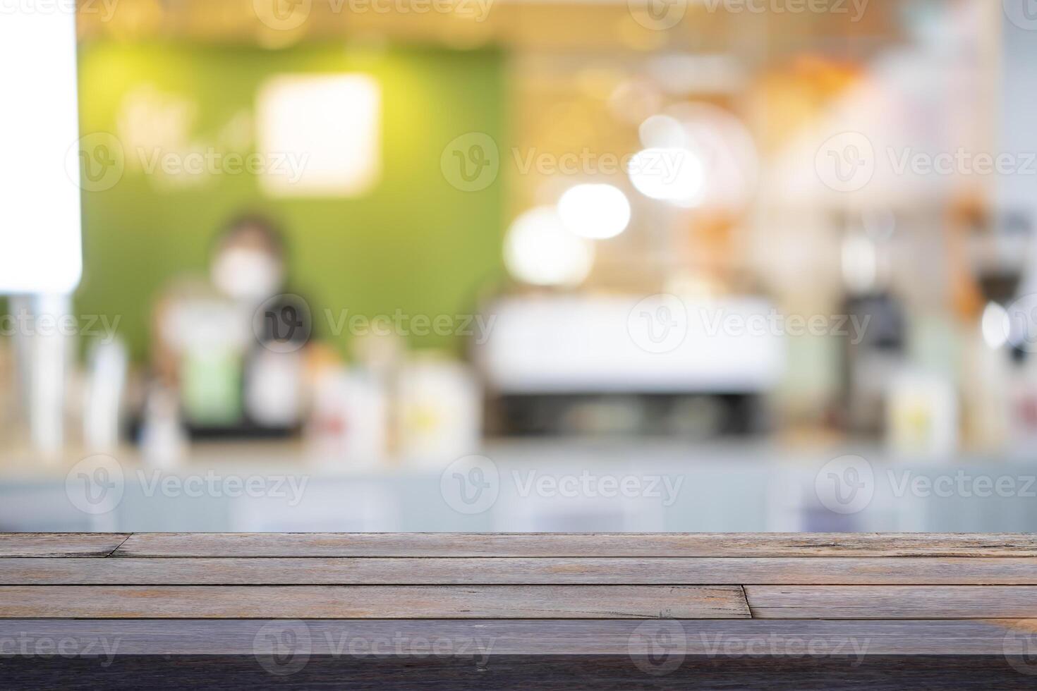 Wood table background, Shelf at cafe shop over blur cafe with bokeh light background photo