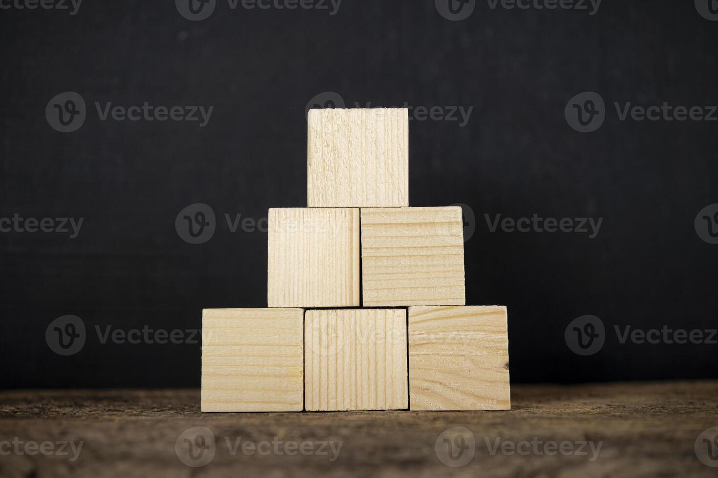 Concept of growth in business,stack of wooden block photo