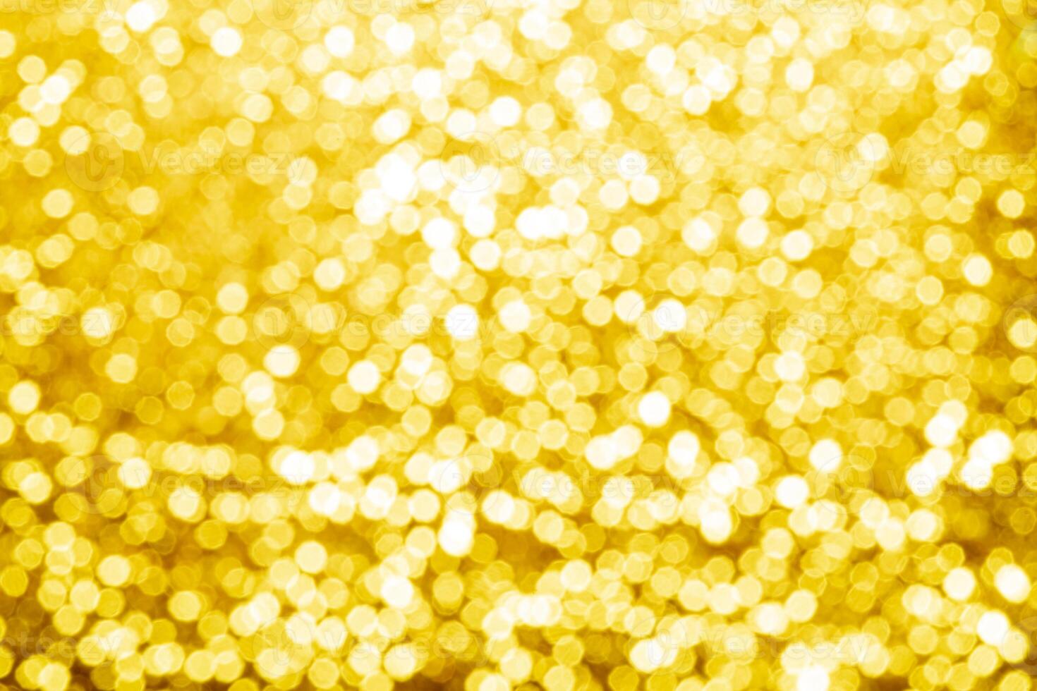 gold abstract background with bokeh defocused lights photo