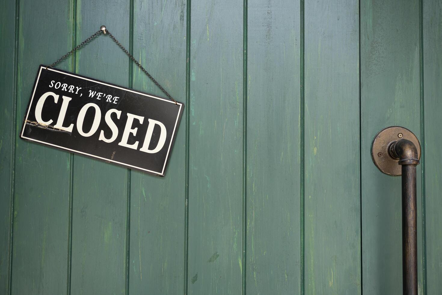 A sign that reads Sorry we are closed photo