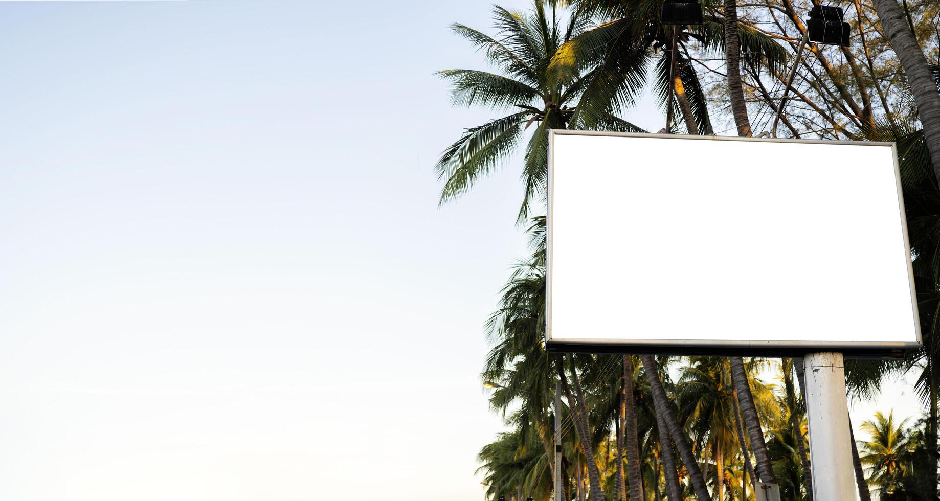 Blank billboard mock up in a sidewalk photo