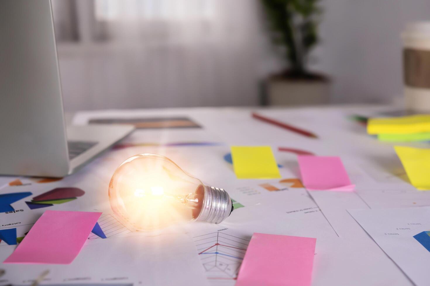 light bulb with laptop computer and creative photo
