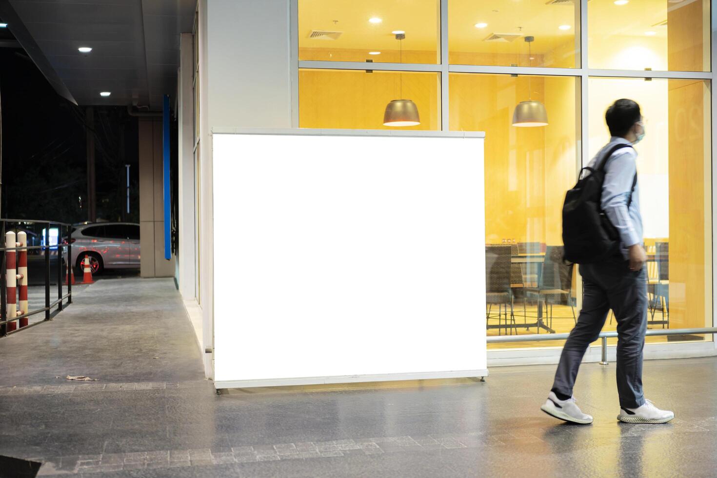 Blank mock up of store street showcase window in a city at night. photo