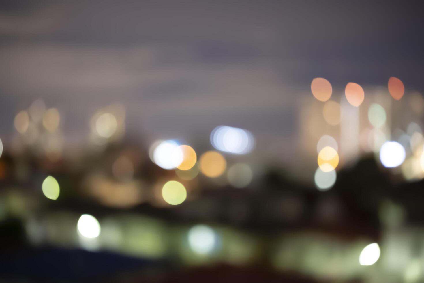 Bokeh abstract background of skyscraper buildings in Bangkok city photo