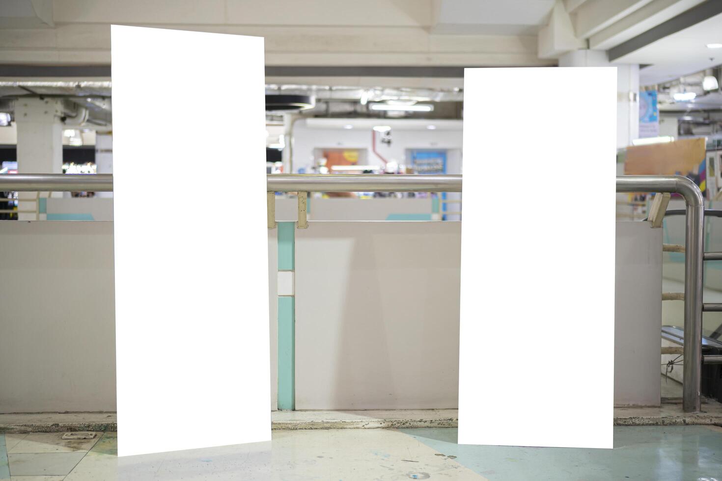 Citilayts with blank screen stands in a large megastore photo