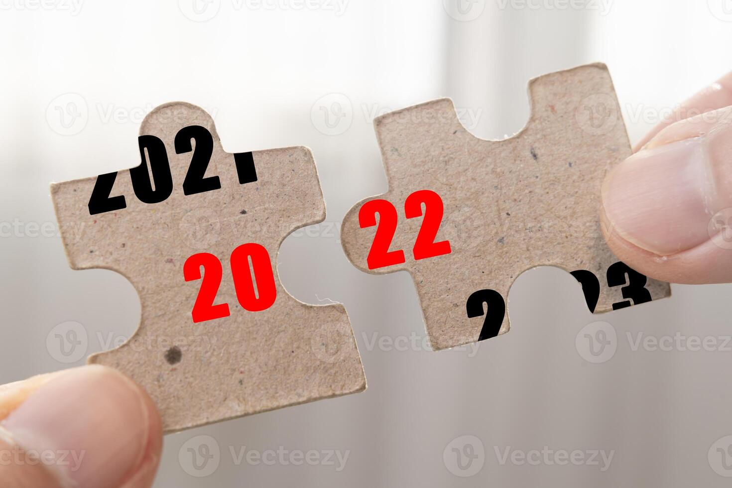 2022 text on cardboard jigsaw puzzle pieces photo