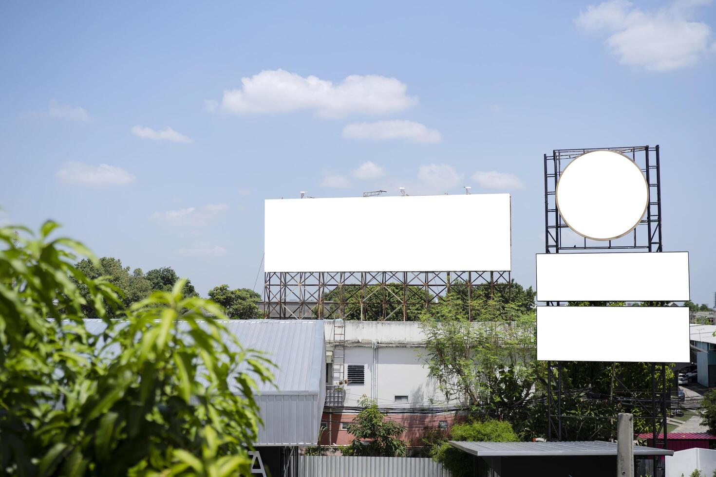Blank white road billboard with Singapore cityscape background at day time photo