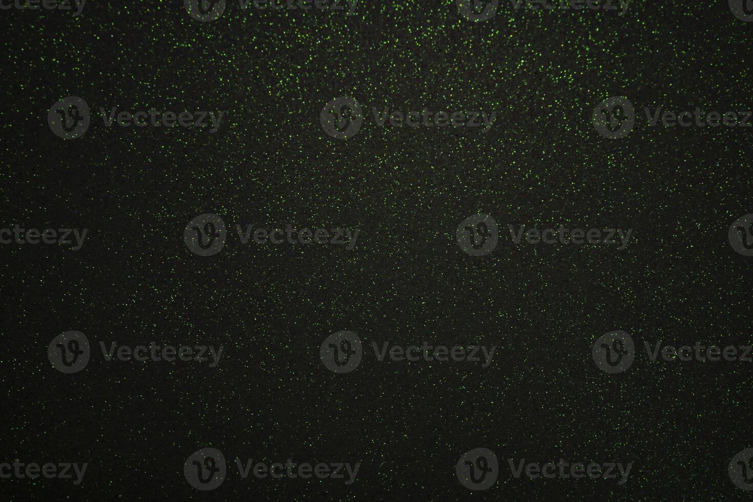 Green sparkling lights festive background with texture. photo