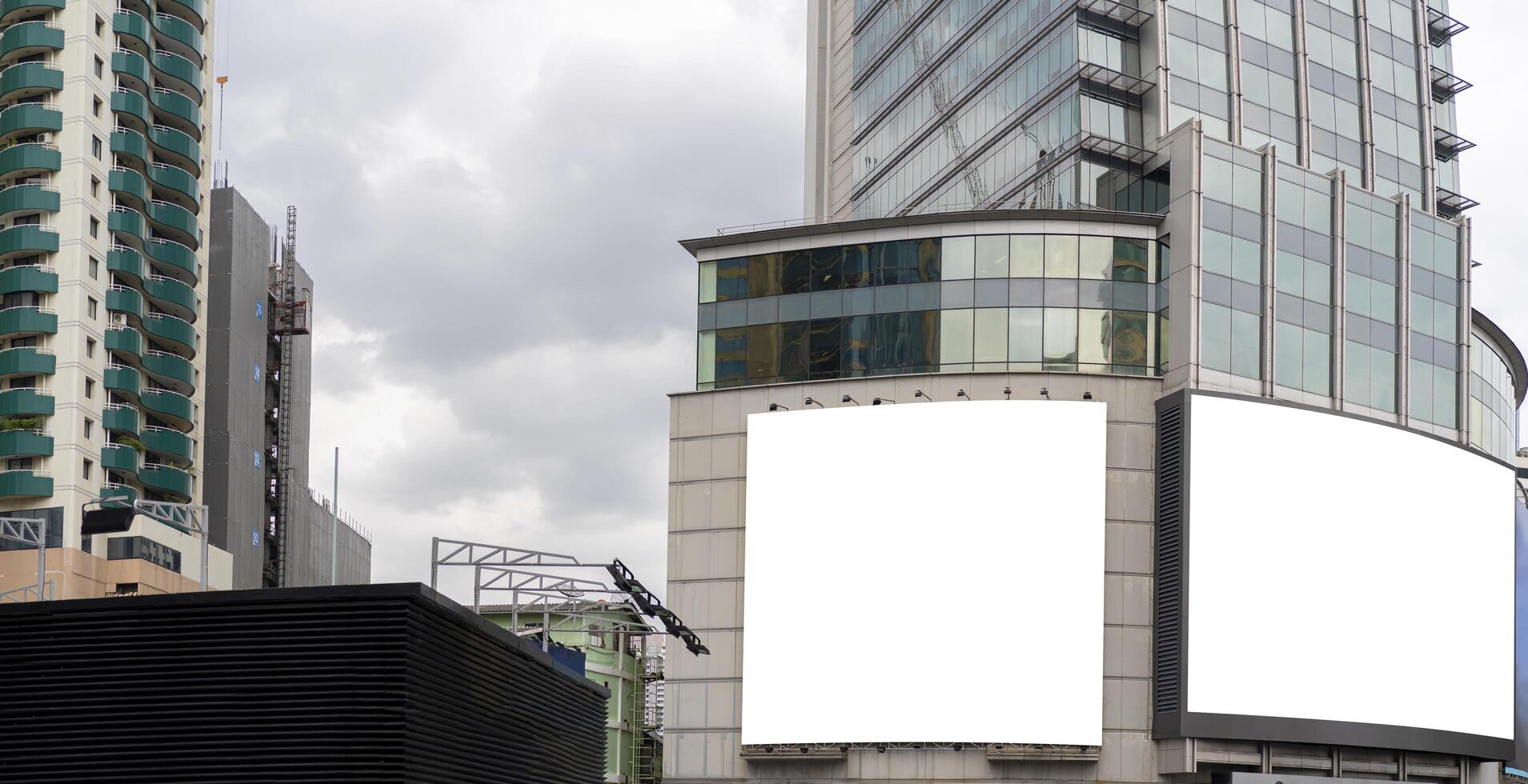 Large blank billboard on a street wall, banners with room to add your own text at Bangkok photo