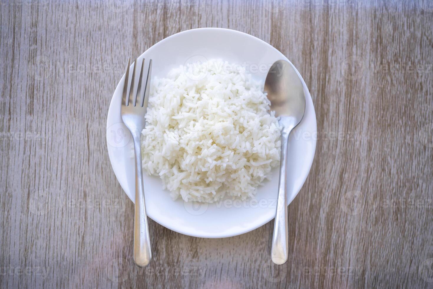 Jasmine rice on white plate from Thailand Asia photo