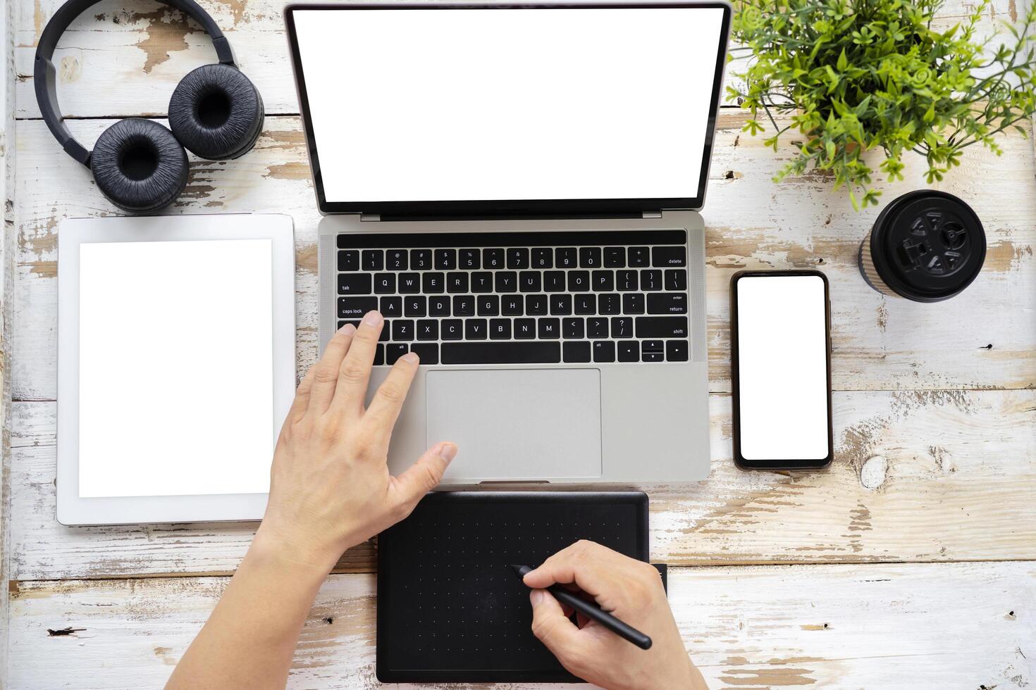 Graphic designer using pen tablet to create digital artwork photo