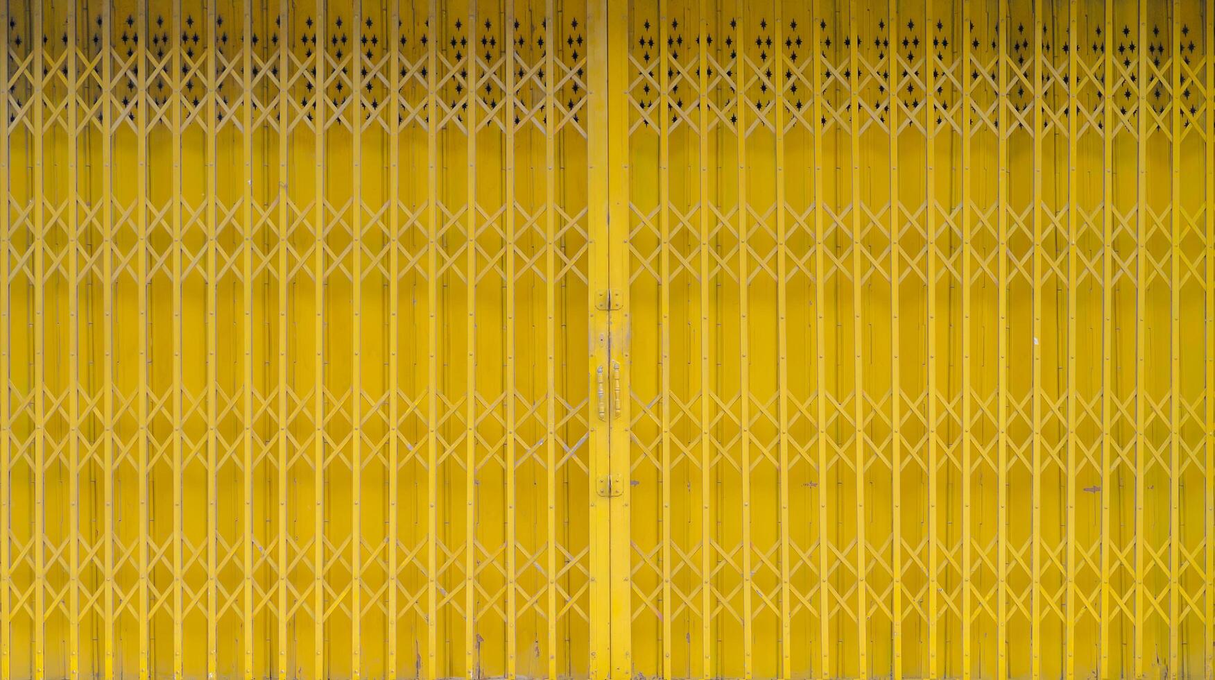 Yellow iron front store gate background photo