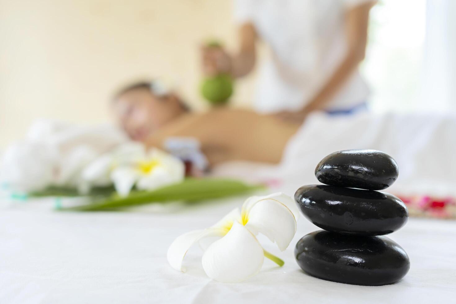 A pile of balancing smooth rocks, spa treatment concept. photo