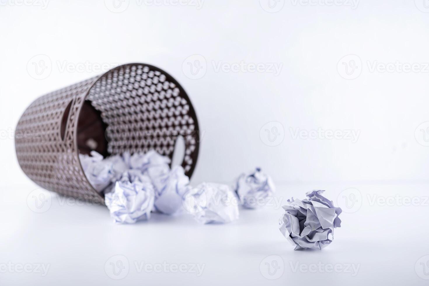 No idea - Crumpled paper can recycle was thrown to metal basket bin. photo
