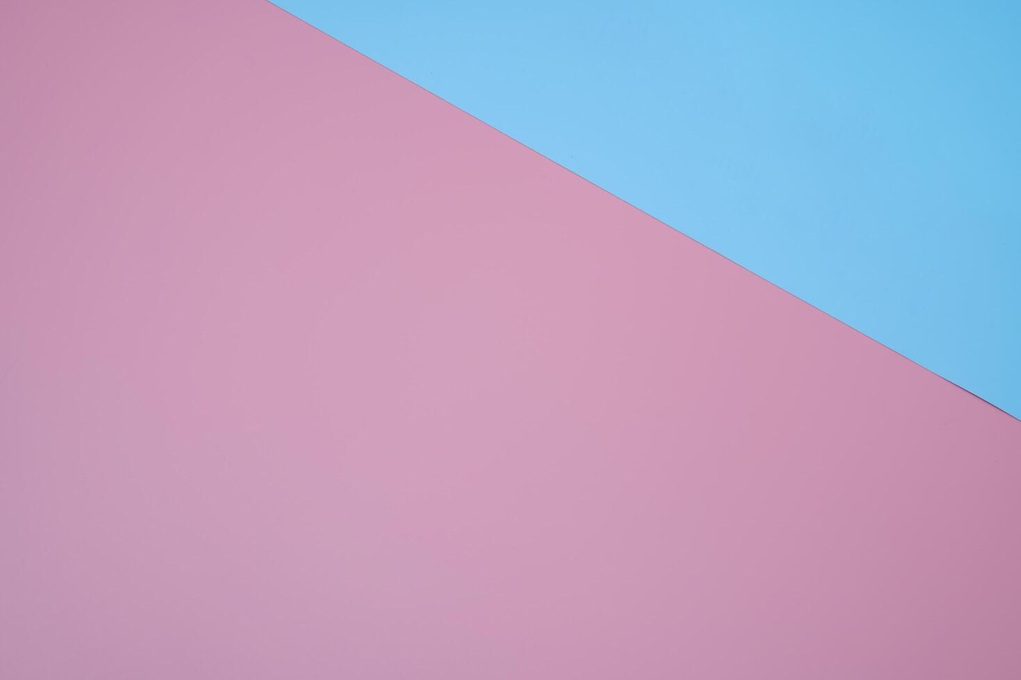 Background of two diagonal rectangles, blue and pink. photo