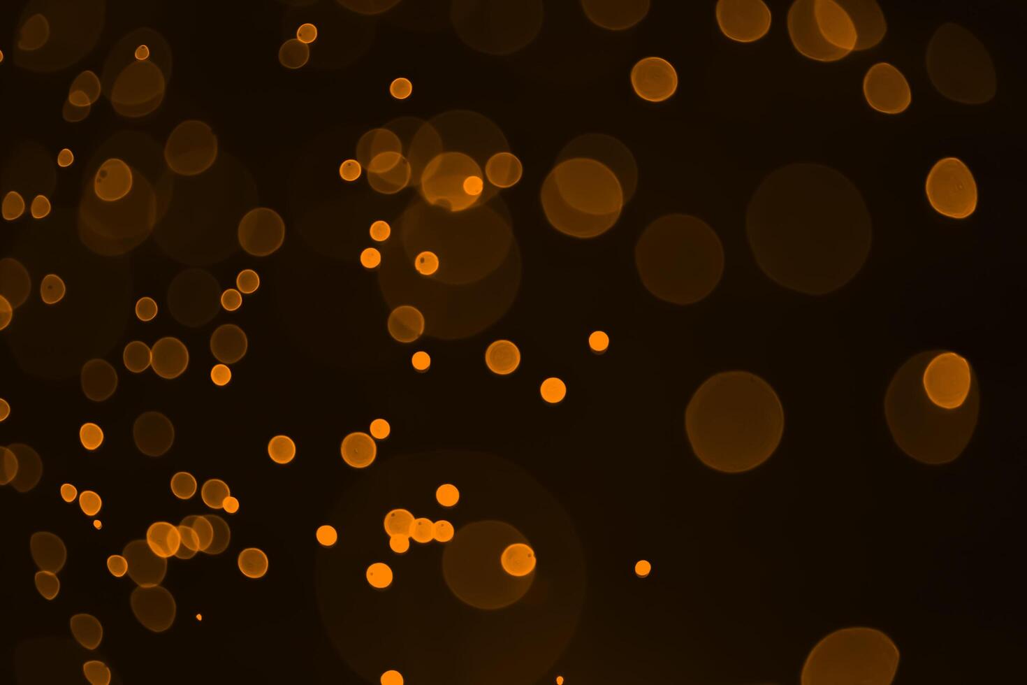 Yellow,orange,red and dark abstract light background, Colorful bokeh,circle shining lights photo
