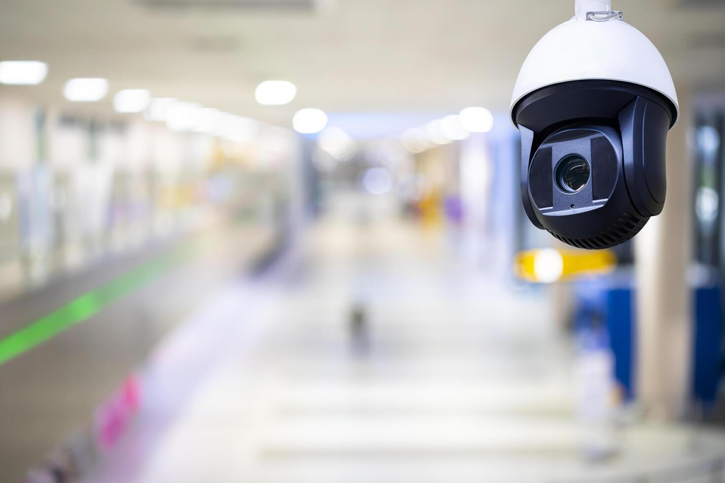 Closed-circuit television,Security CCTV camera or surveillance system in background of Checkpoint - Body and bag Luggage Scan Machine photo