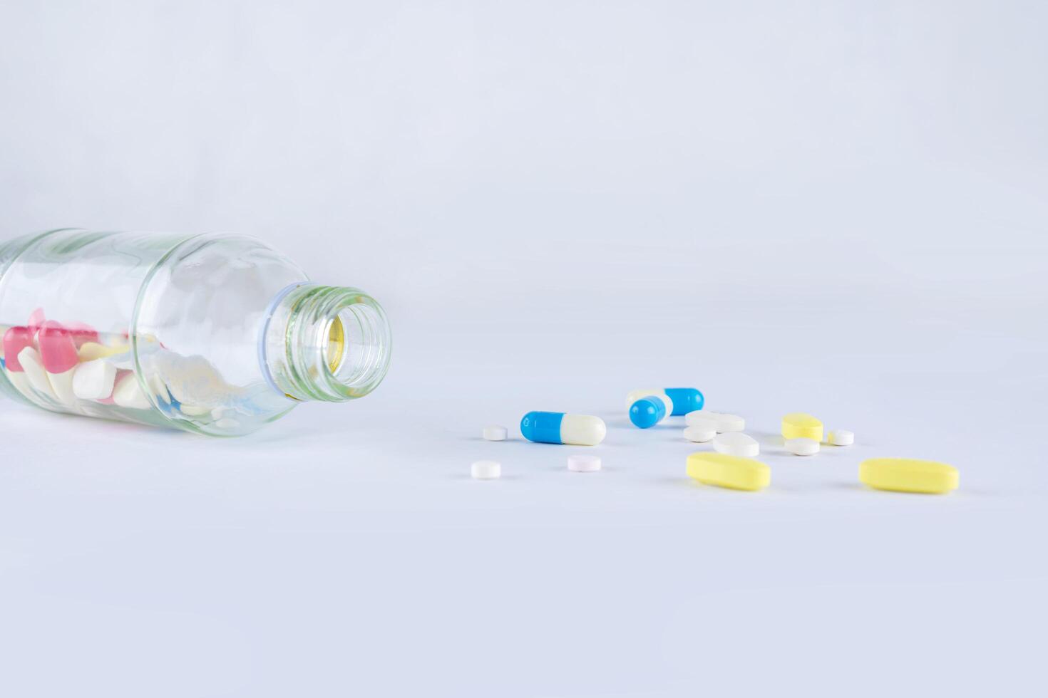 Selective focus of antibiotic capsules pills on blur background. Drug resistance concept. Antibiotics drug use with reasonable.. Pharmacy drugstore background. Pharmaceutical industry. Pharmaceutics. photo