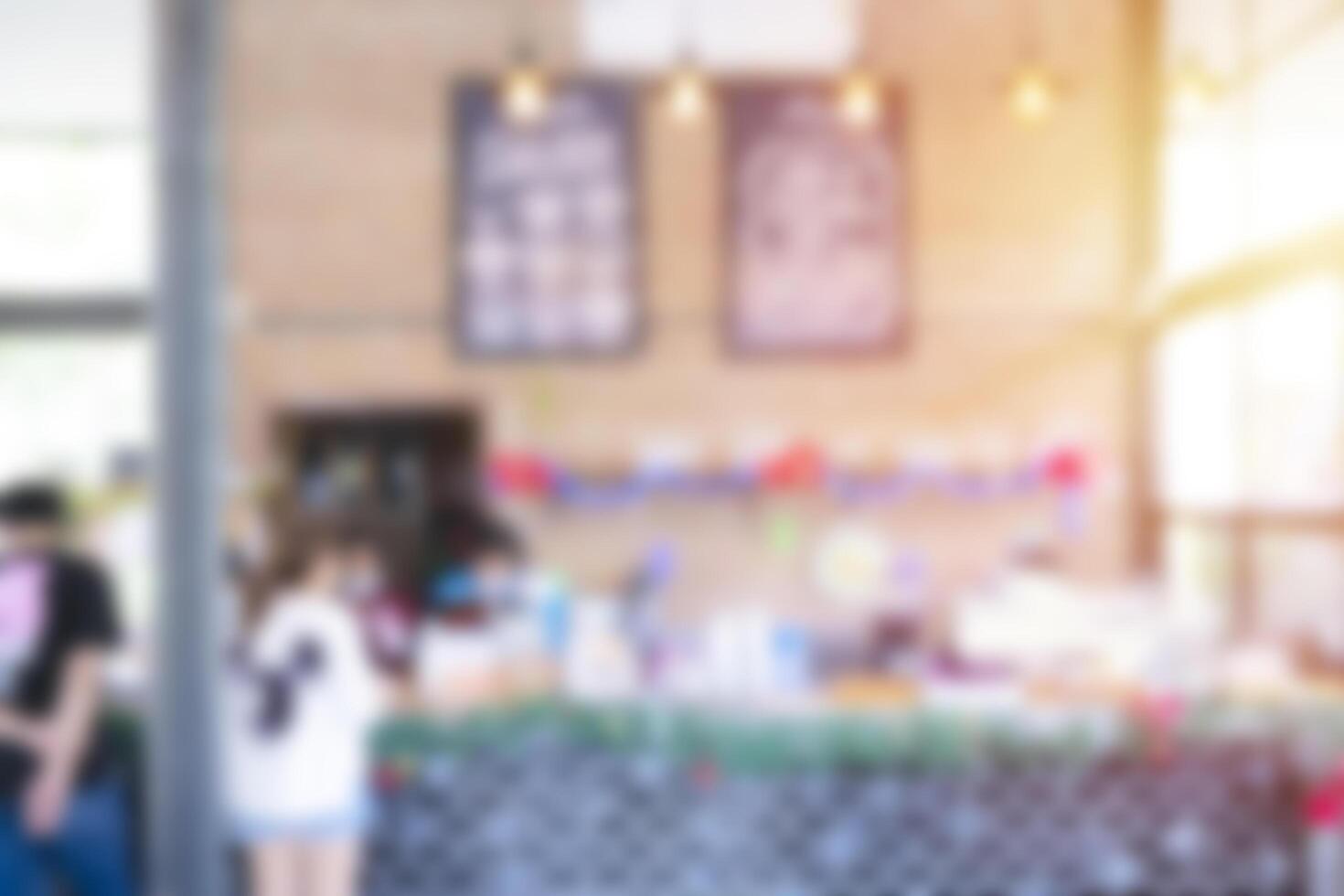 Blur coffee shop or cafe restaurant with abstract bokeh light image background photo