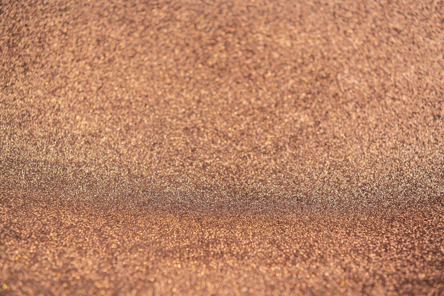Glitter vintage lights background. dark gold and black. de focused photo