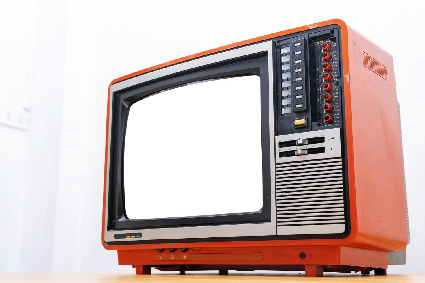 Vintage TV set isolated. Retro television - Old vintage red television, retro technology. Ancient tv concept photo