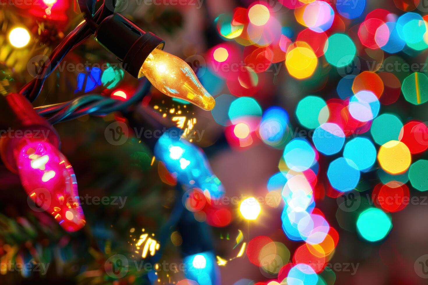 String of christmas lights hanging on a christmas tree creating colorful bokeh photo
