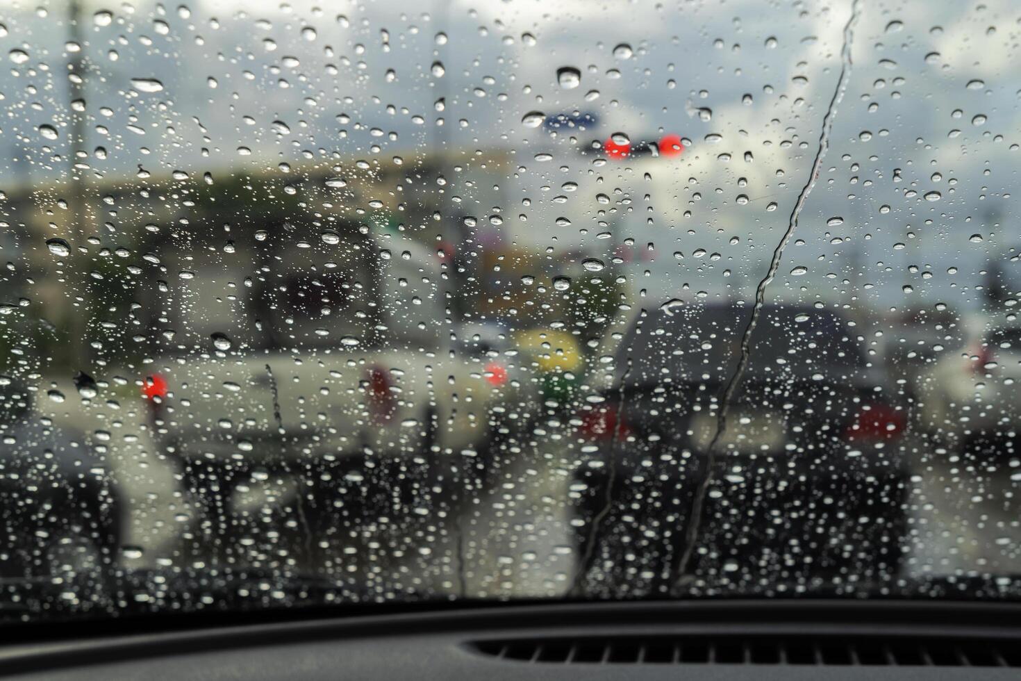 Close-up raindrops from the windshield photo