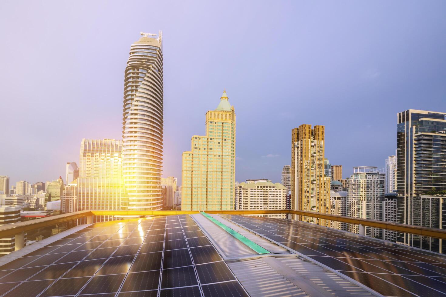 Investment concept. Renewable energy is a necessity of the future world.Solar Cell Future Energy.Big Solar Cell check with the engineer.Double Exposure Panorama.Big city needs electricity. photo