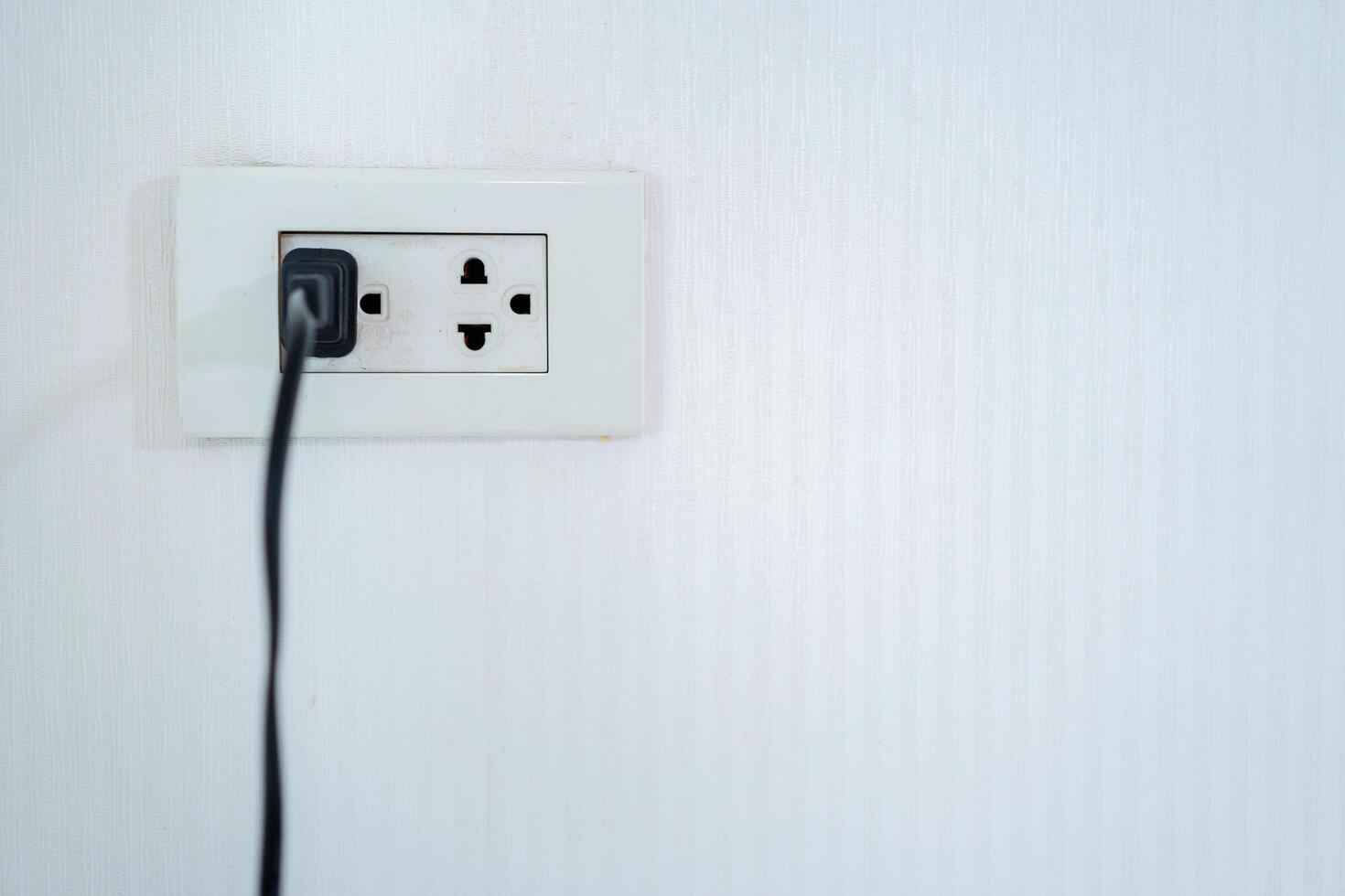 Electricity demand concept The plug in the plug has another space photo