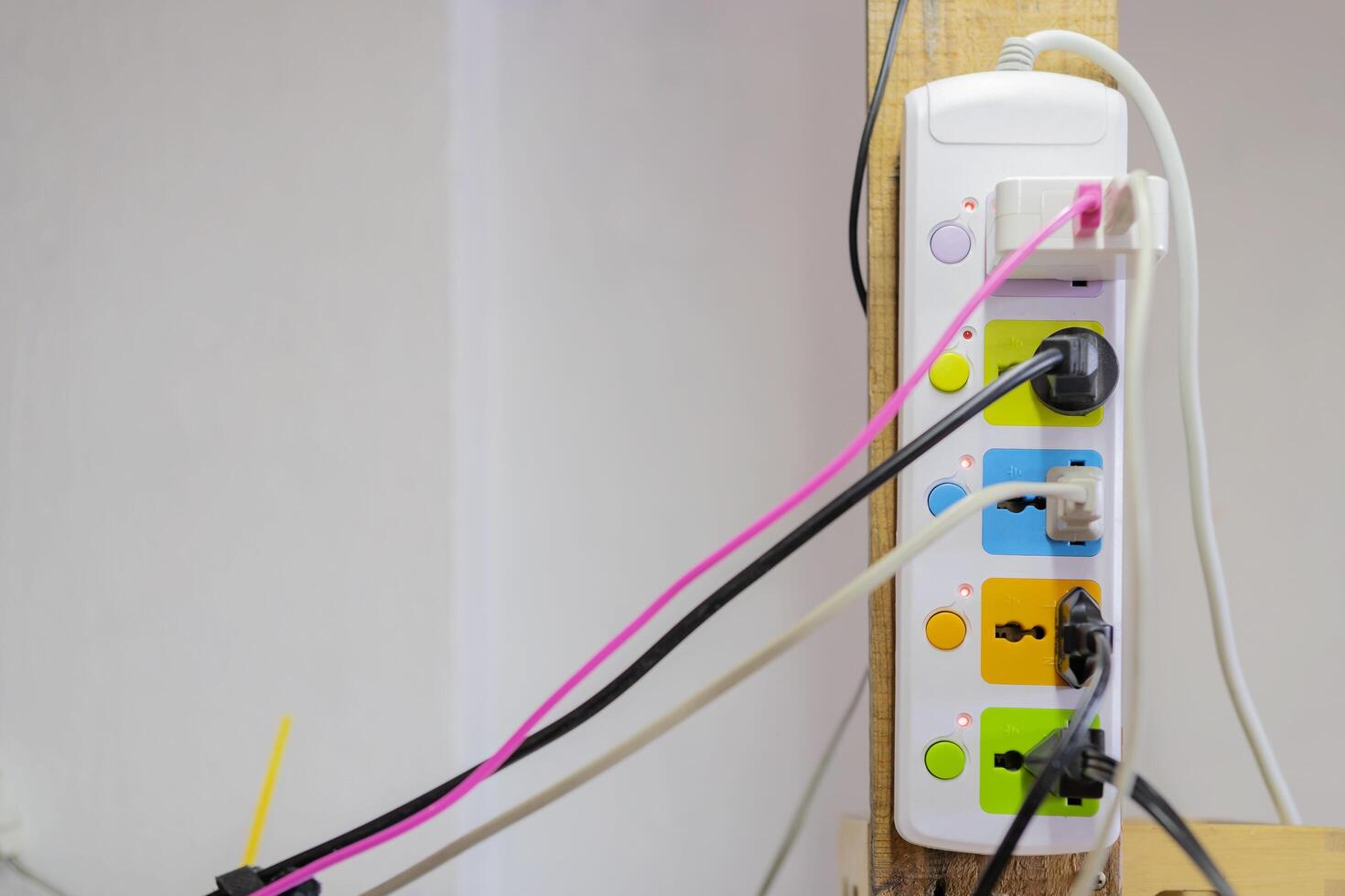 Multiple socket with connected plugs photo