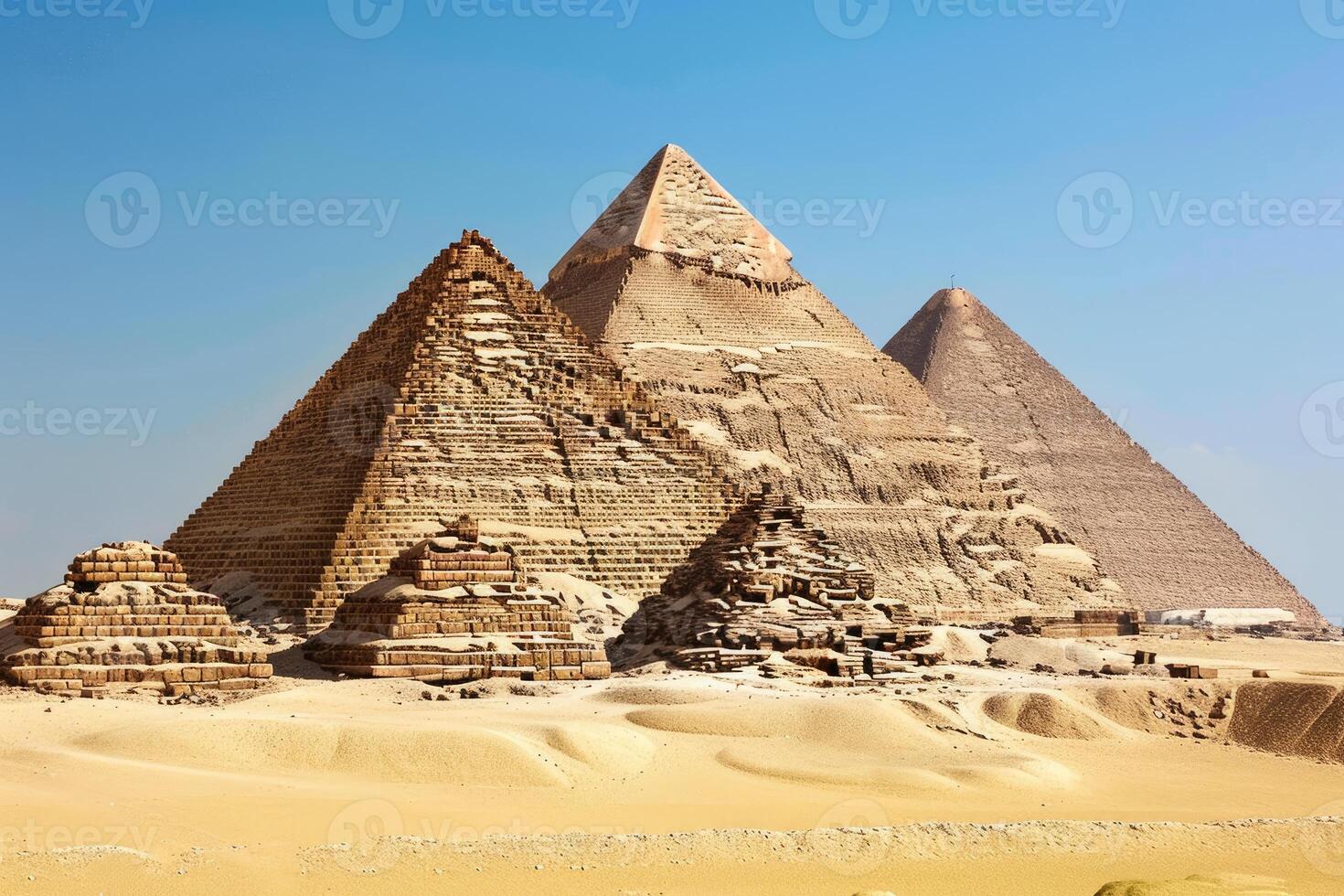 Majestic pyramids of giza under the clear blue sky photo