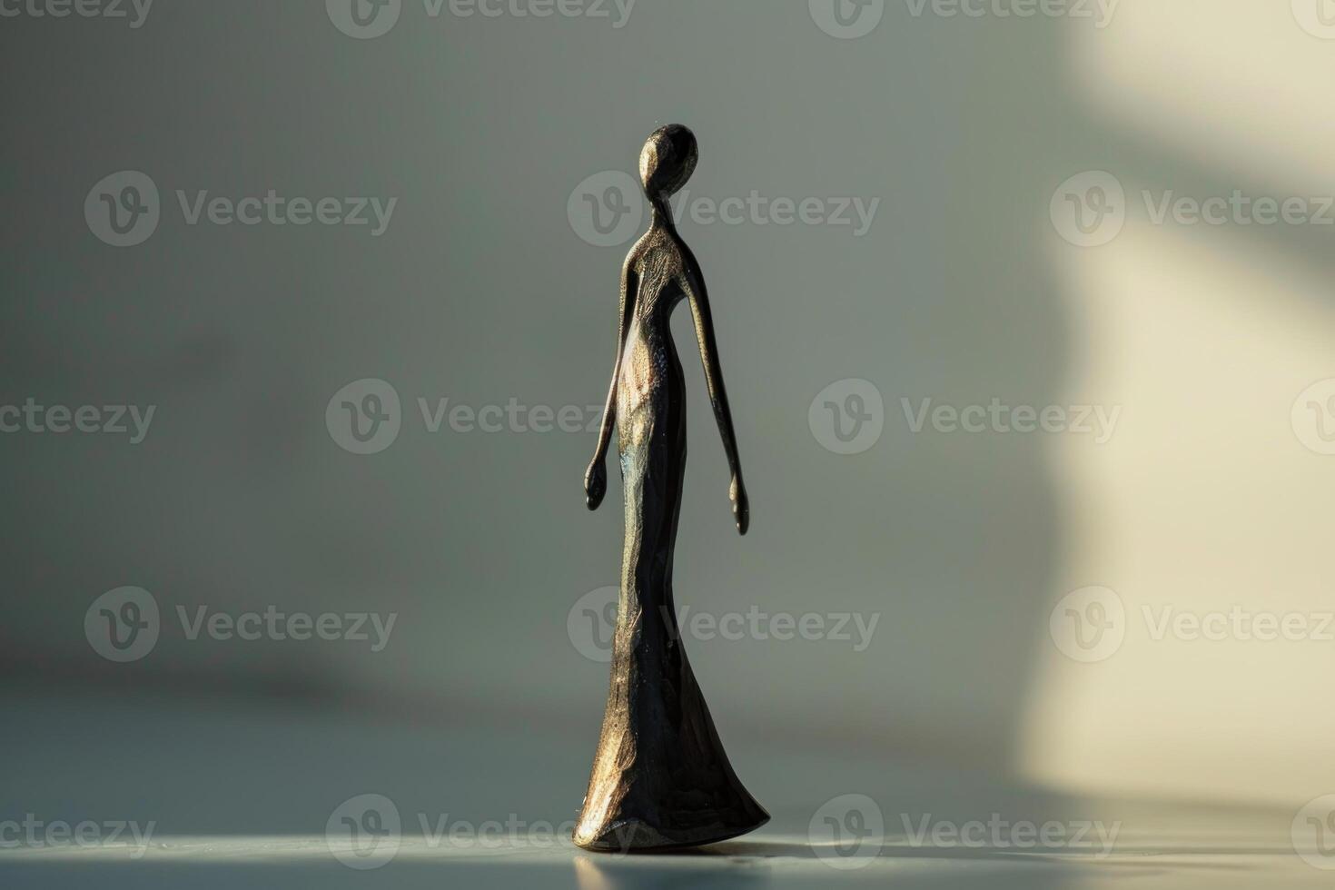 Elegant abstract figurine in soft light photo