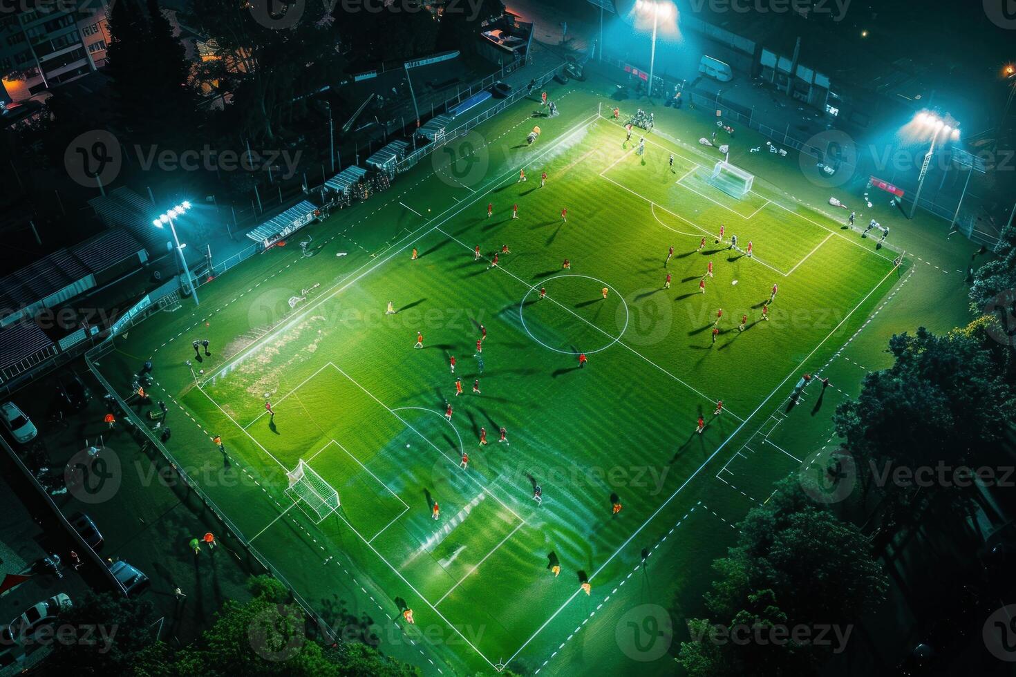 Nighttime aerial view of soccer match in action photo