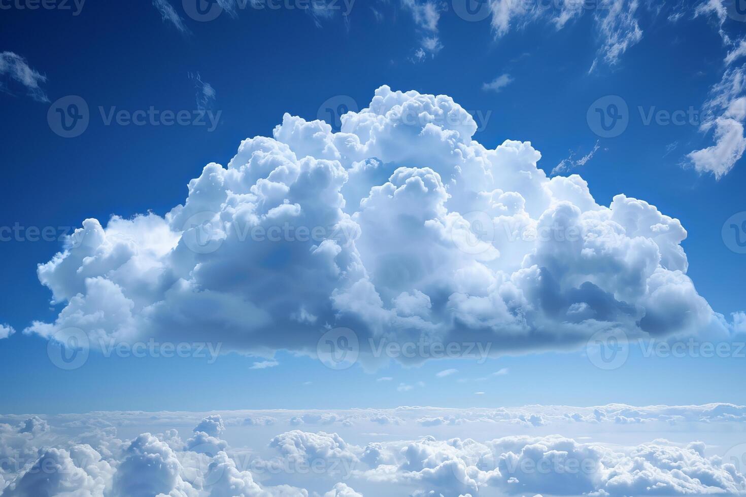 Majestic cumulus clouds above a clear blue sky photo