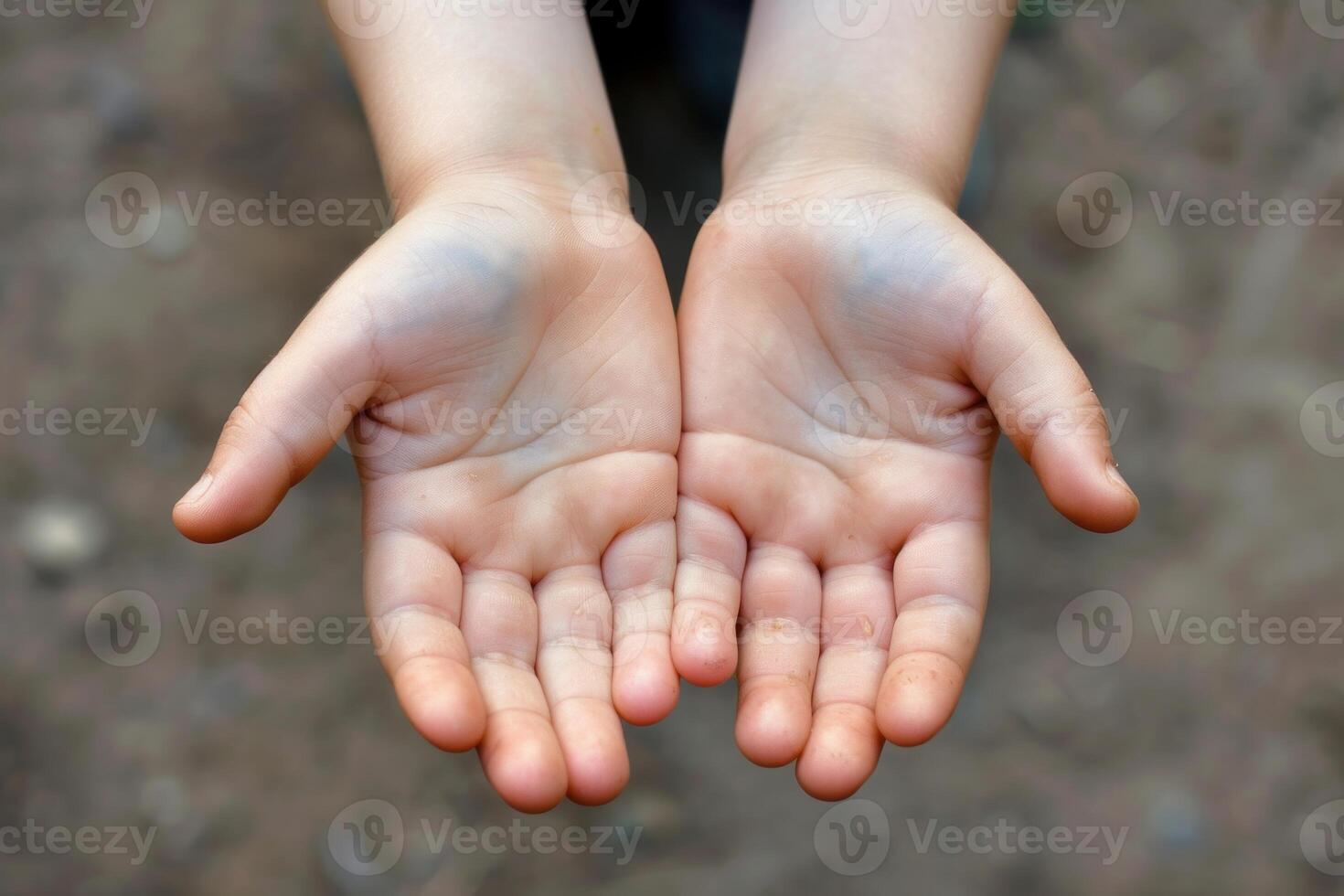 Closeup of open, empty hands extended forward, symbolizing giving, receiving, or assistance photo