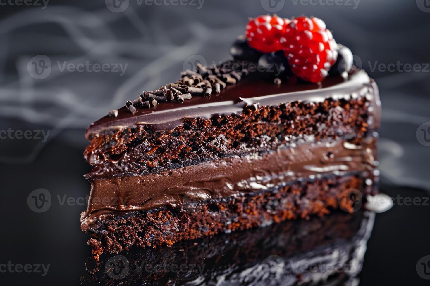 Decadent chocolate cake slice with berries photo